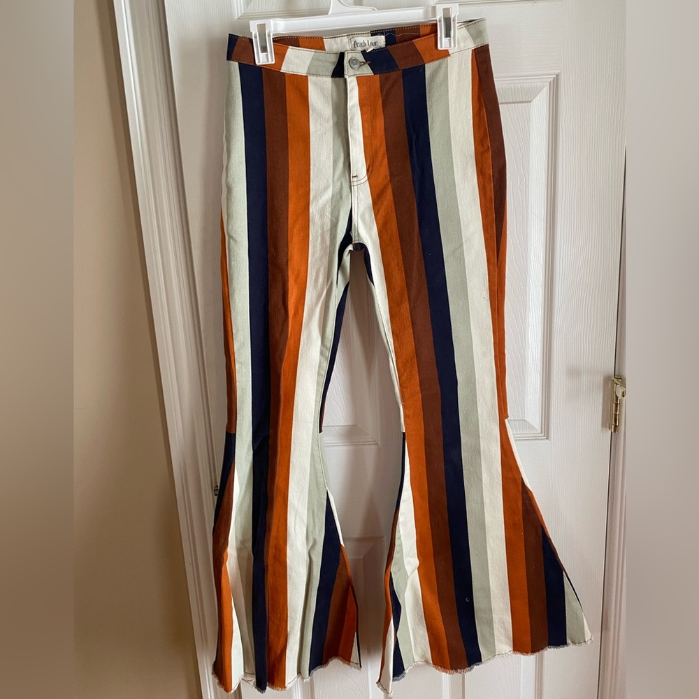 Striped bell bottom pants.